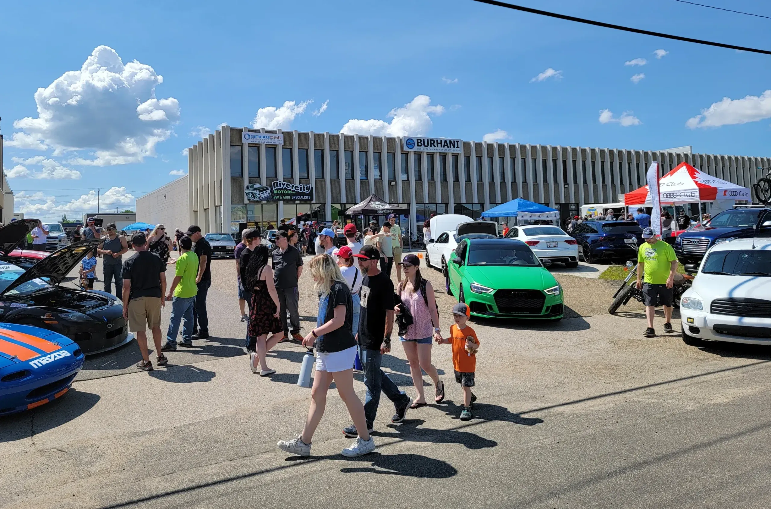 Crowds checking out cars at a past Rivercity Motors Show n' Shine